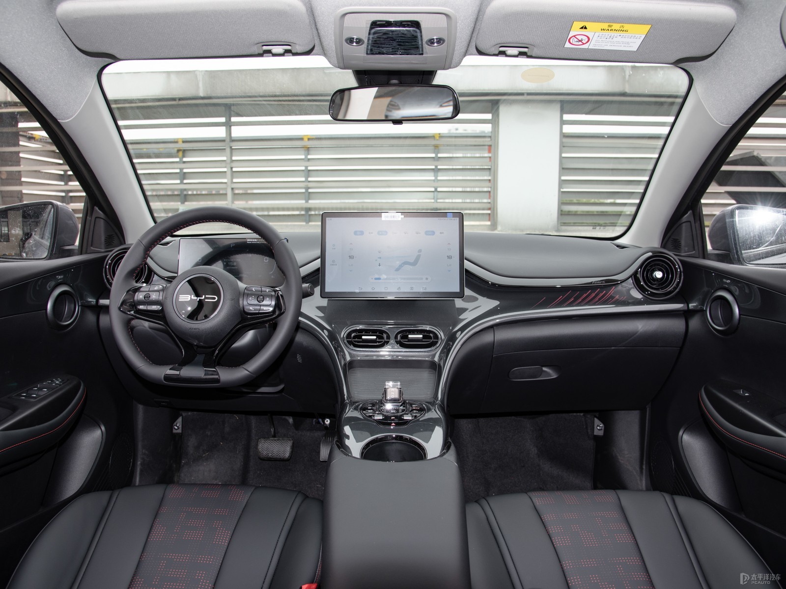 BYD E2 Deluxe Edition — Further exterior angle of the same vehicle. Image 3 of 3. Modified new car for export from China.