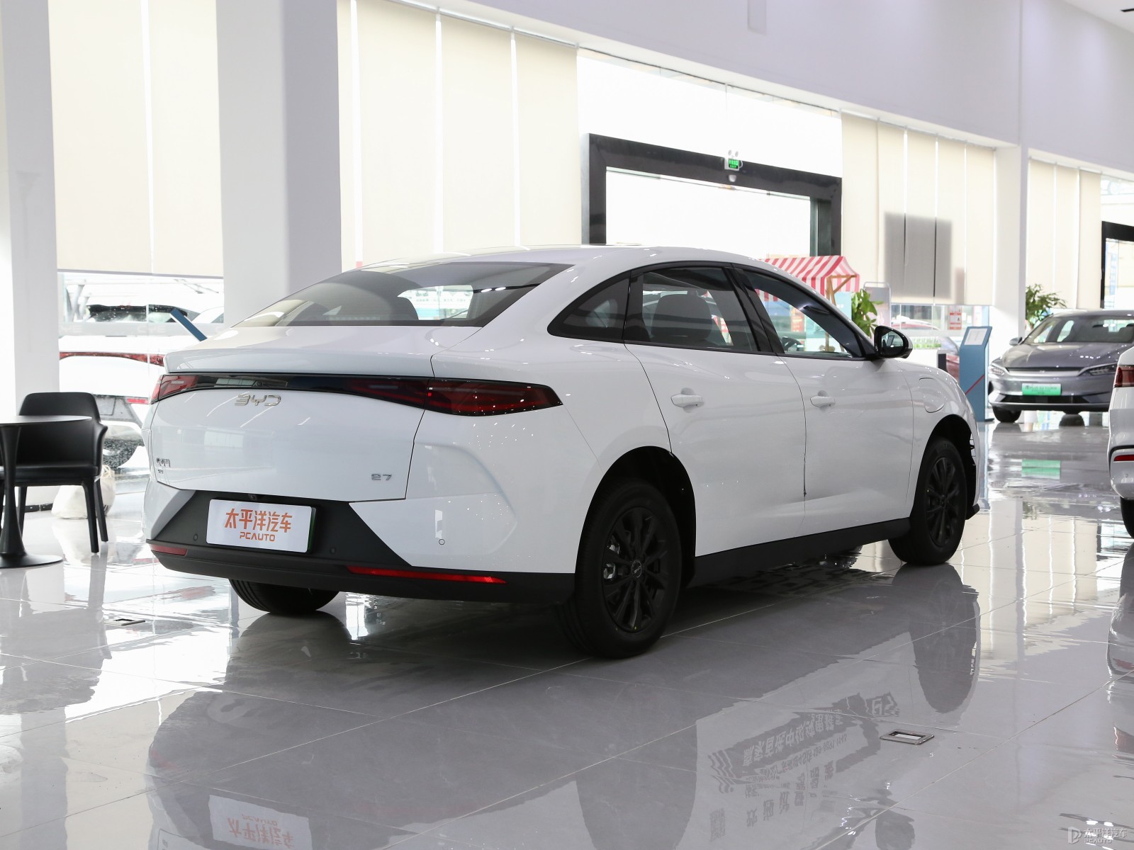 BYD E7 520 Smart Travel Edition — Additional exterior view. Image 2 of 3. Authorized new car for export from China.